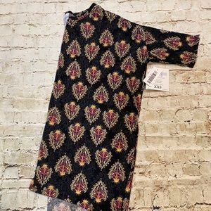 Lularoe XXS Irma shirt top black background new with tags